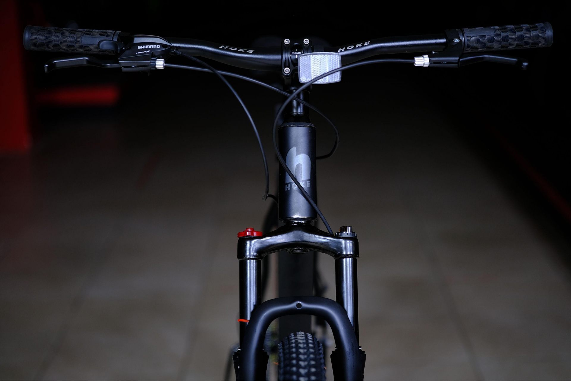 Вилка амортизационная пружинная 100 mm с функцией регулировки и блокировки хода (механическая блокировка) HOKE ONE WAY 29 матовый чёрный 21